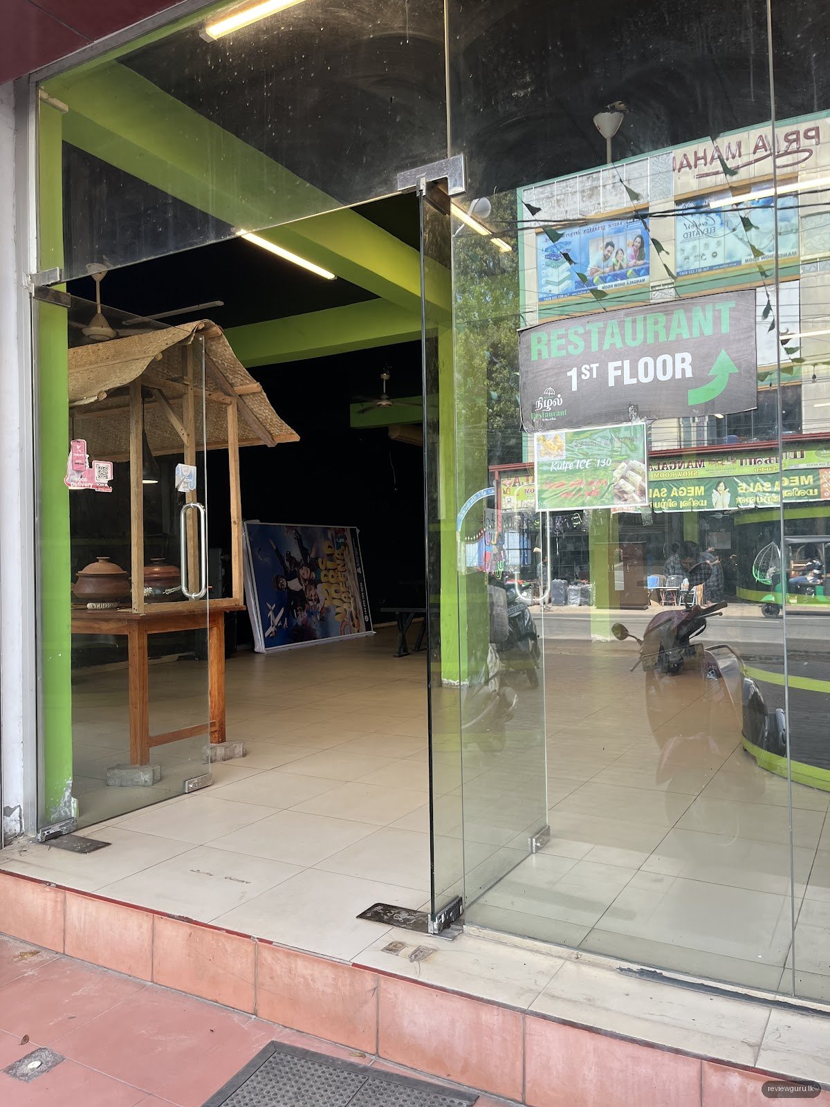 Nizhal Cafe and Restaurant